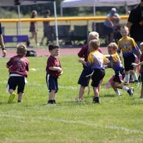 Flag football teams lined up at the line of scrimmage