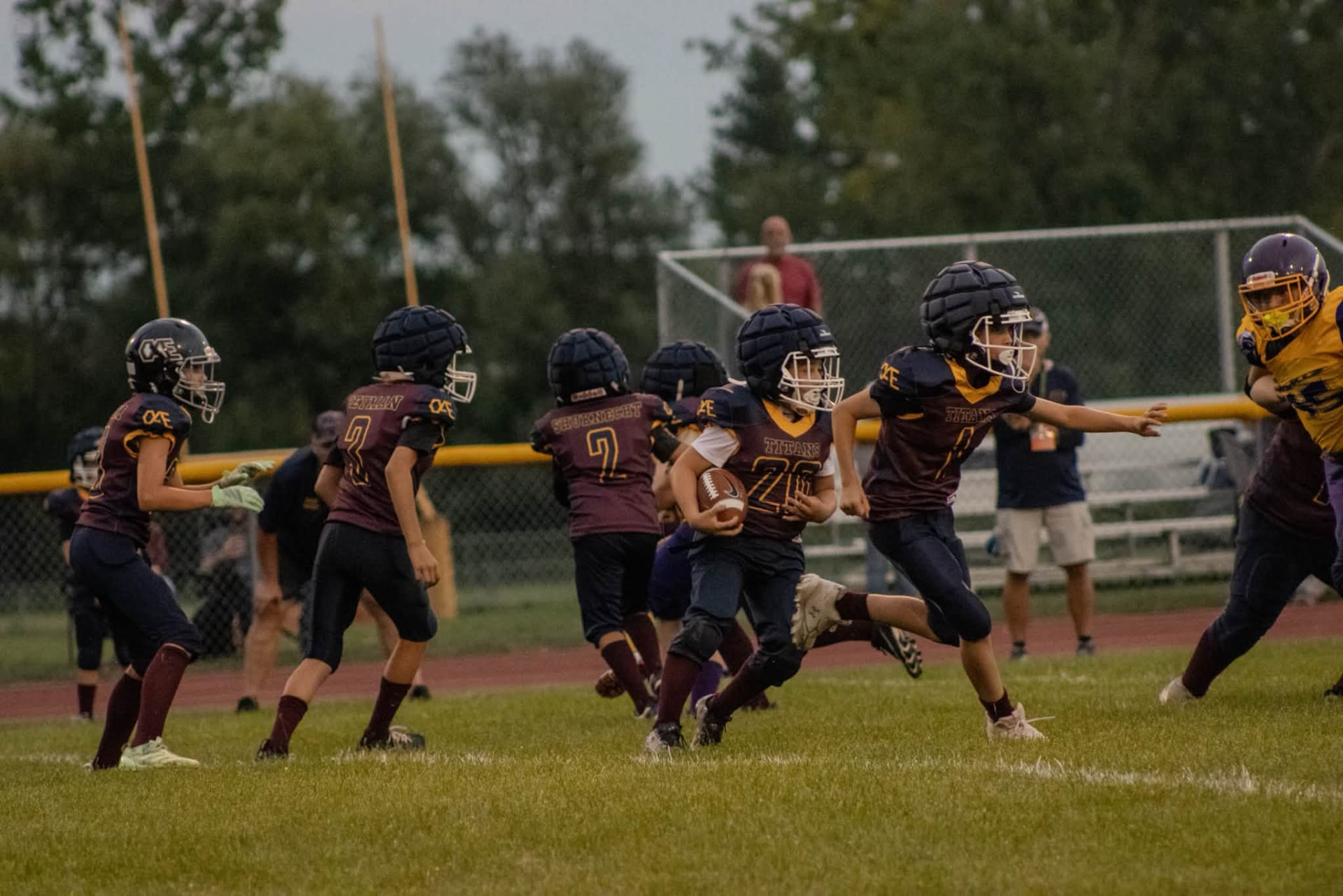 Titans ball carrier breaking free down the field