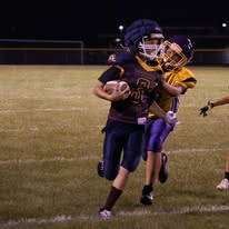 Titans ball carrier running with the ball at night