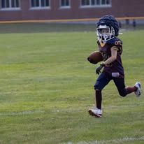 Titans ball carrier sprinting down the field