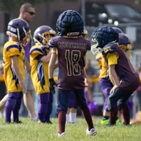 Titans football players huddled during a game