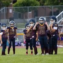 Titans football players lined up on the field
