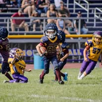 Titans ball carrier running through the defense